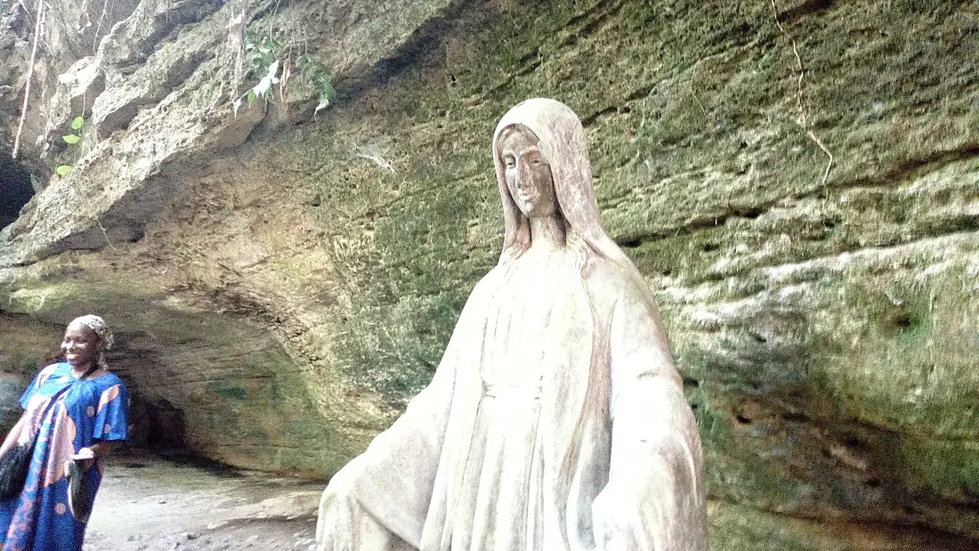 Statue of Mary at the Cave on the path to Awhum waterfall