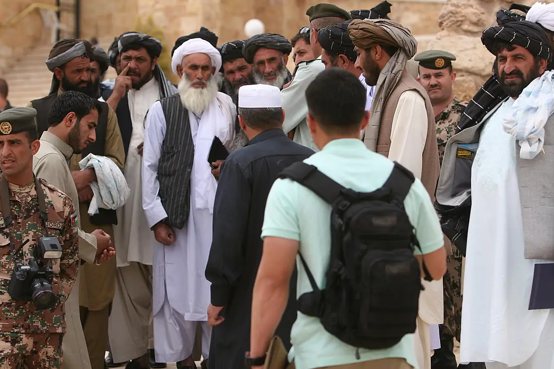 Afghan men visit the Cave of the Seven Sleepers in Amman, Jordan, April 21, 2011 110421-M-GW940-070