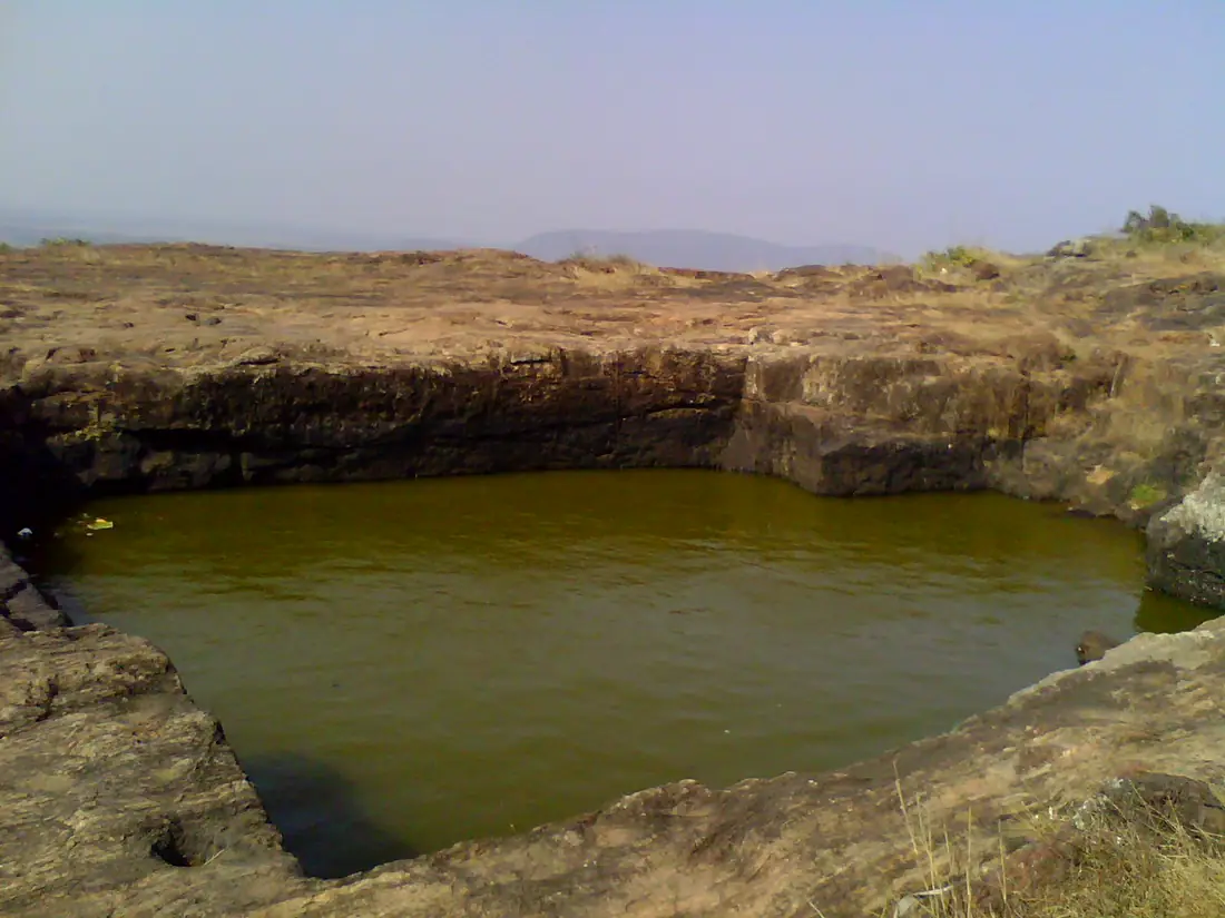 Medium sized rock cut cistern at pavuralla konda at bheemunipatnam