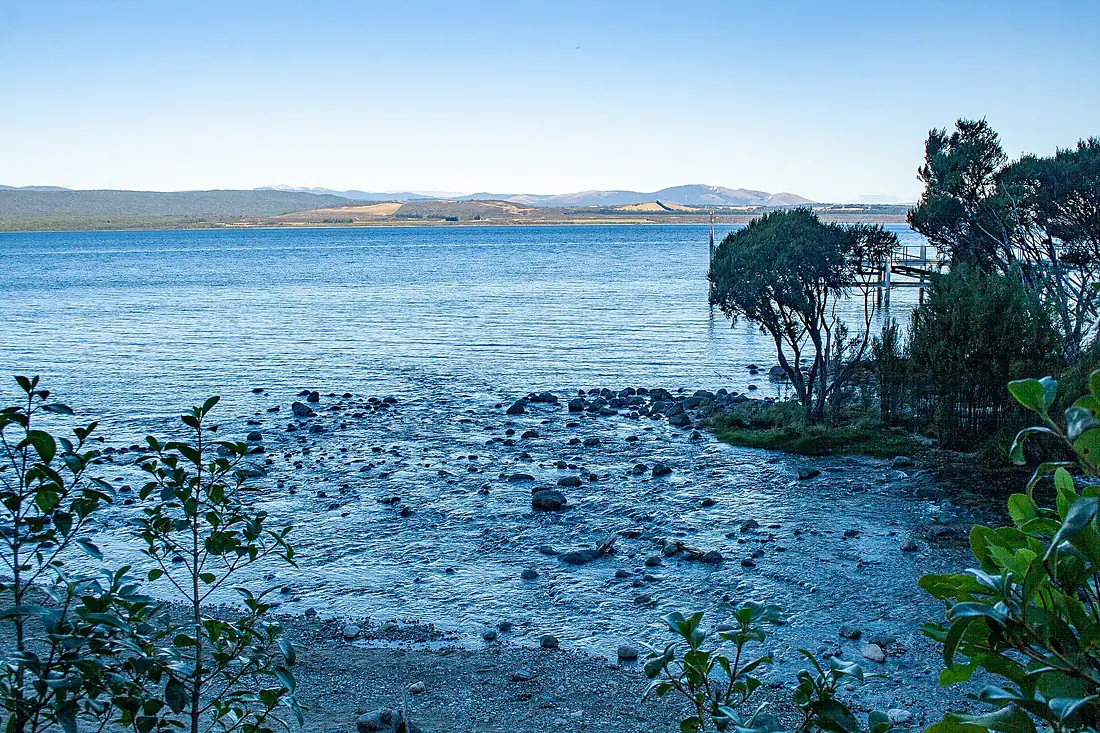 Shore of the lake at the Te Anau Glowworm Caves